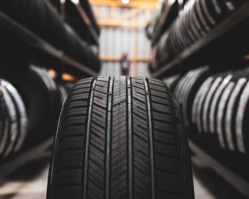 A new tire is placed on the tire storage rack in the car workshop. Be prepared for vehicles that need to change tires.